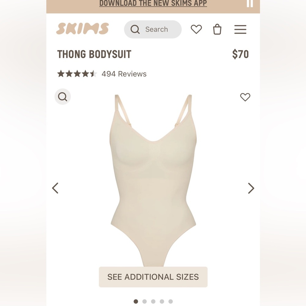 Skims sculpting thong bodysuit in size S/M. Brand new. Never worn in box.